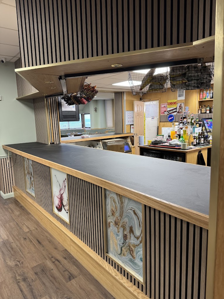 Commercial bar fit-out with timber slat panelling