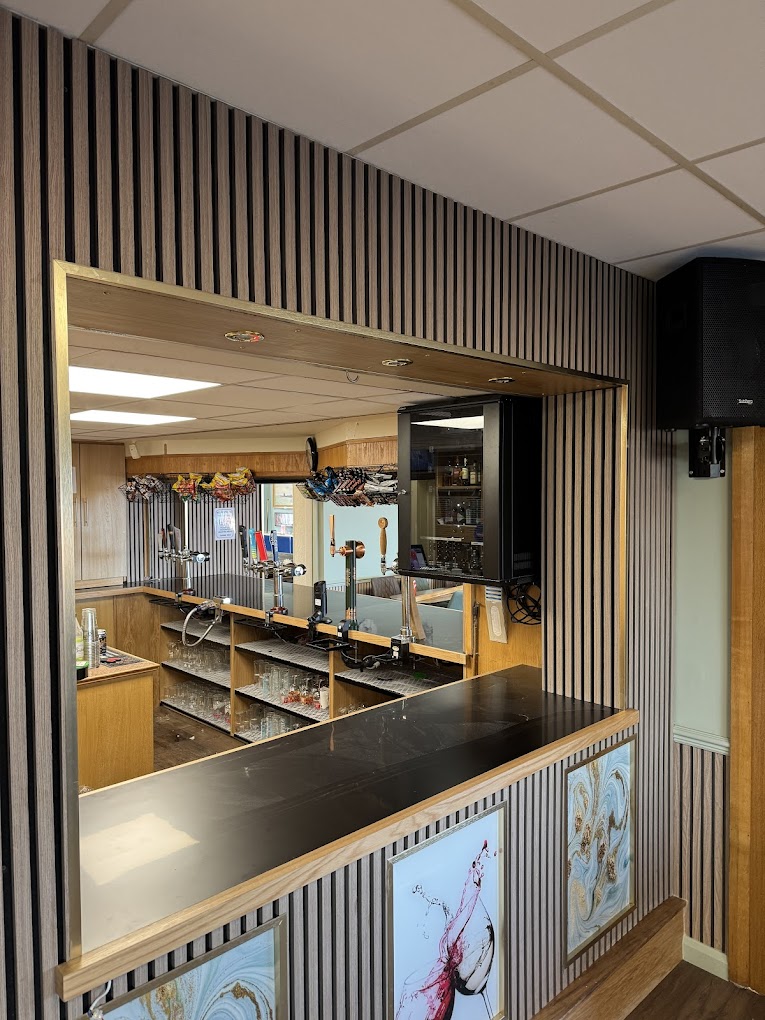 Bar servery with timber slat surround
